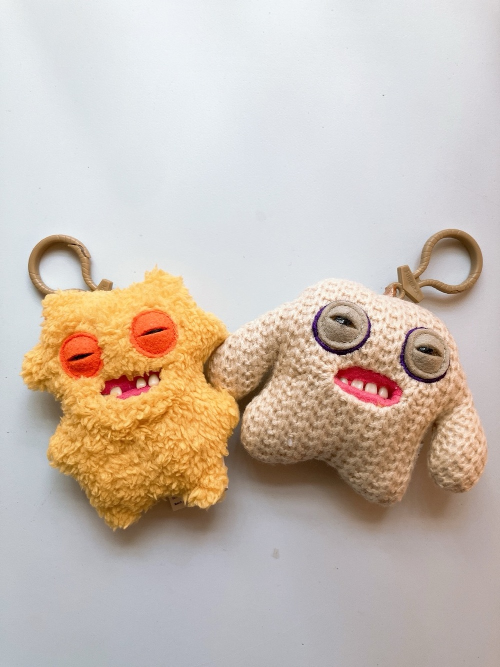Two Fuggler keychain bag charm stuffies